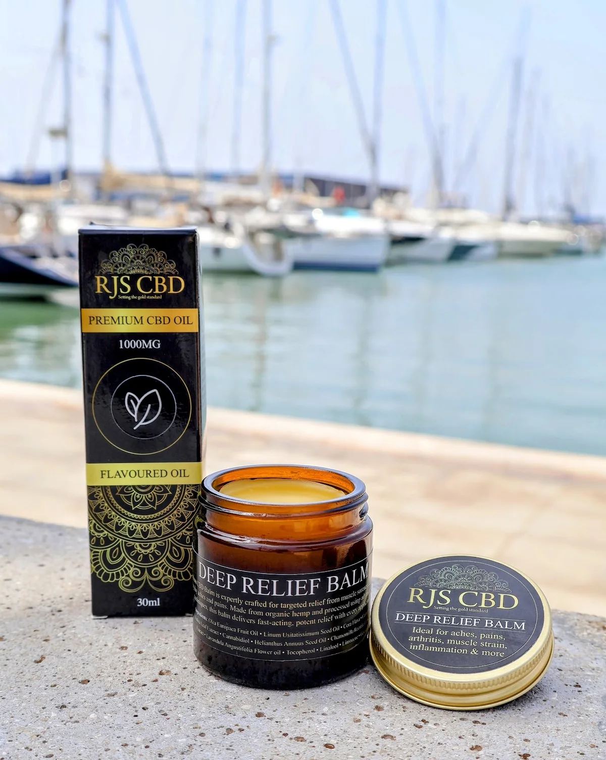 Balm by RJS CBD beside a marina
